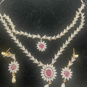 Ruby and zirconia Necklace with earrings.